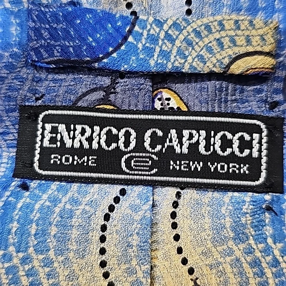 ENRICO CAPUCCI mens 100 % silk hand made tie. New York Rome. Blue/gold. 60 X‎ 4